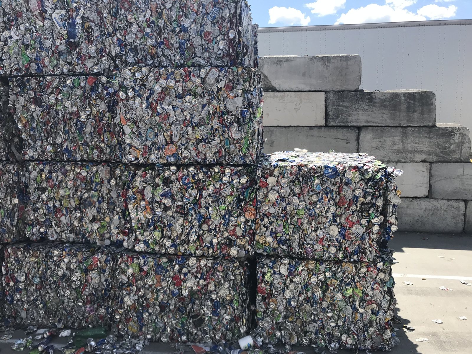 Stacks of compressed recovered materials awaiting processing